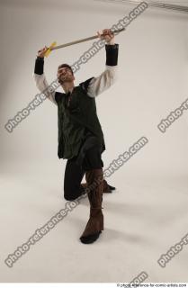 09 2019 01 KEETA KNEELING POSE WITH SWORD